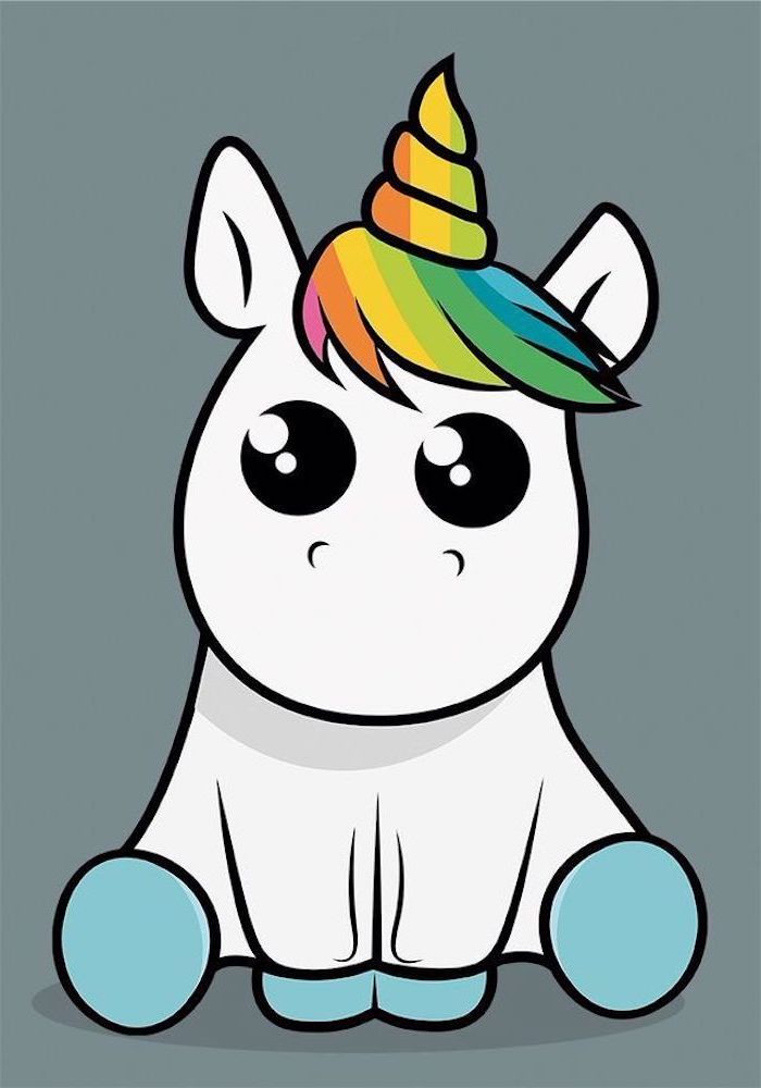 a white unicorn with a rainbow mane sitting down